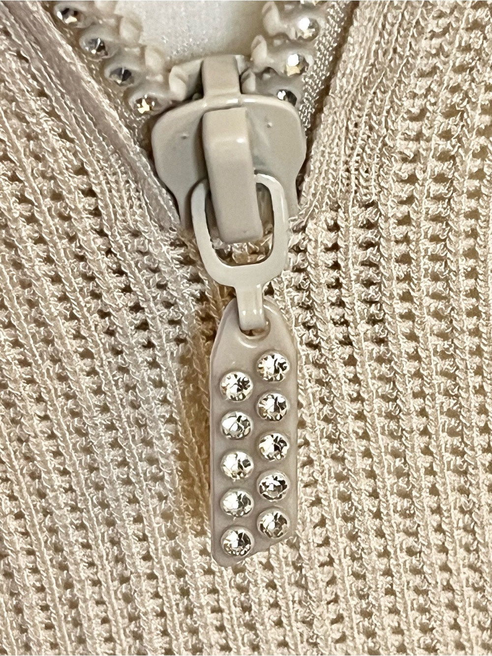 Sleeveless Zip Front Knit Top in Cream with Black Trim Jeweled Zipper